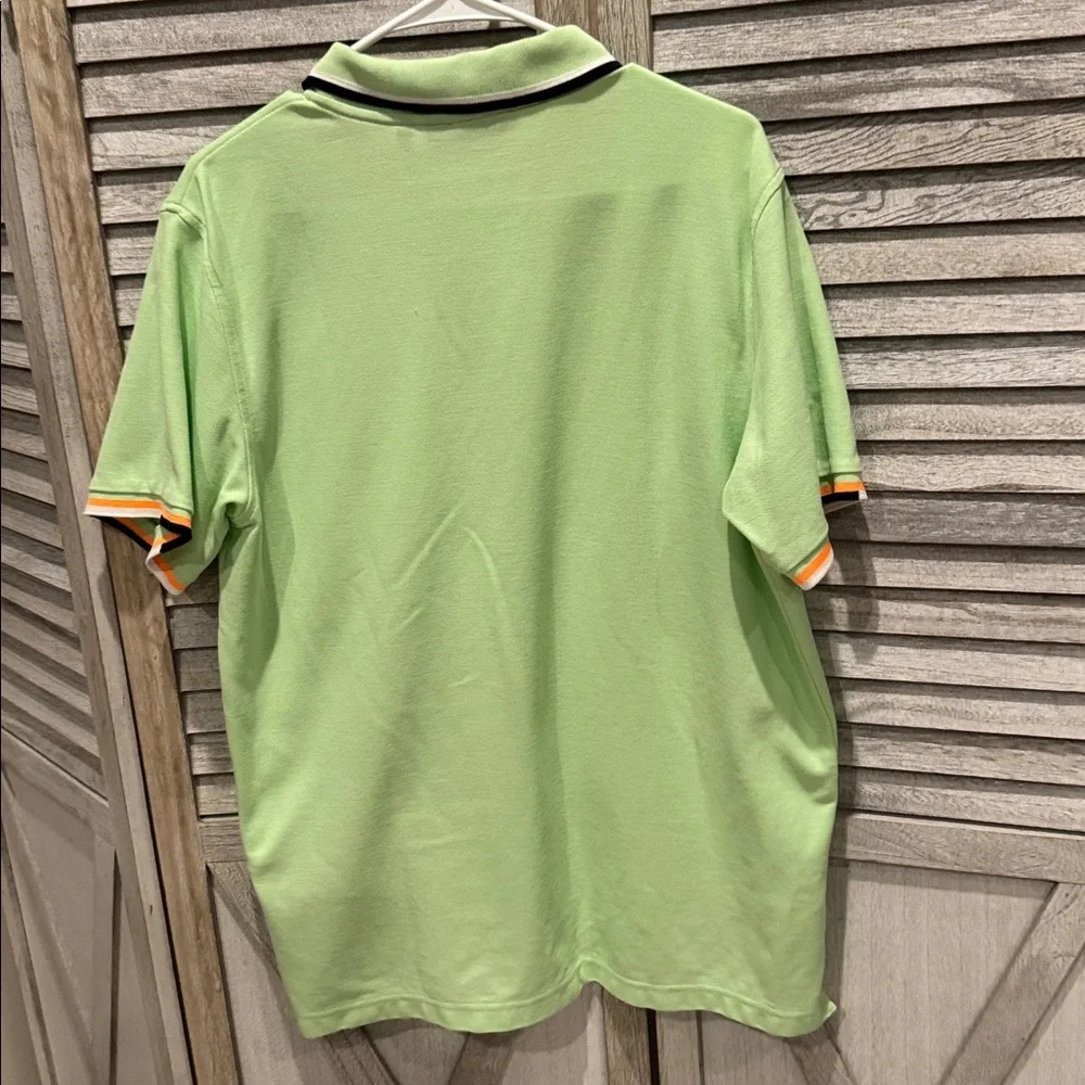 118. Psycho Bunny Light Green men’s Polo with Orange Accents, pre owned size. 6
